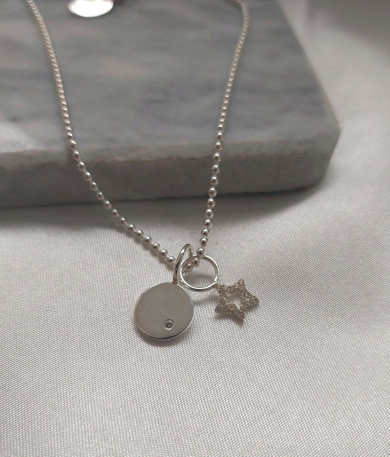 Pair your Star Charm with our Hazel Silver Beaded Necklace & Silver Initial disc charm to create your own look